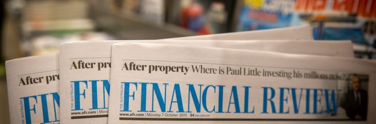 Textured surface in a warm reddish-brown hue.