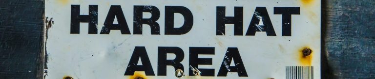 Abstract textured surface in varying shades of blue.